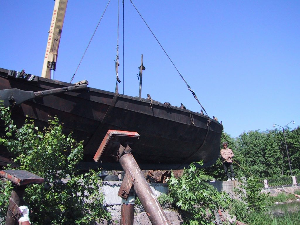 Replica Viking ship under sail on open water